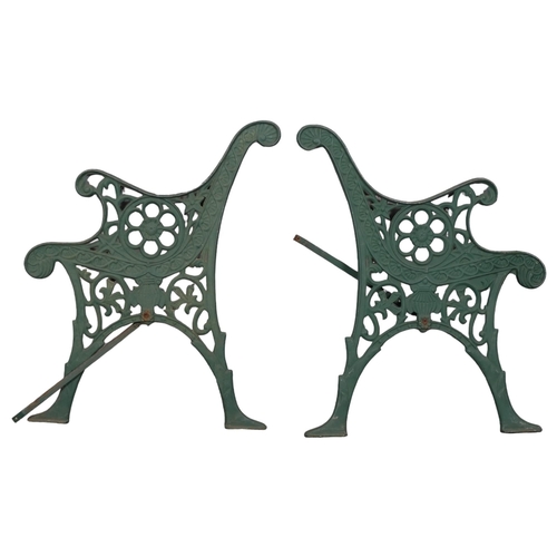 2982 - A pair of painted cast iron garden bench ends. 60x72cm.