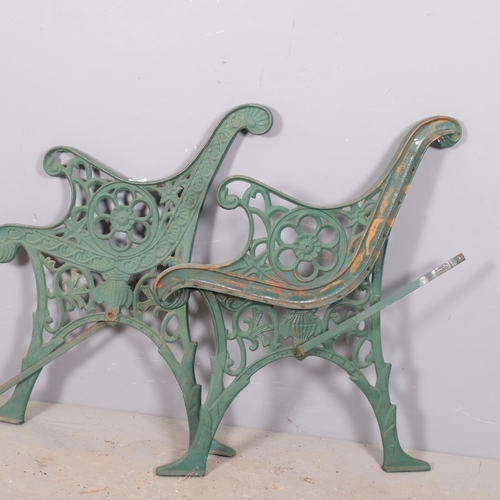 2982 - A pair of painted cast iron garden bench ends. 60x72cm.