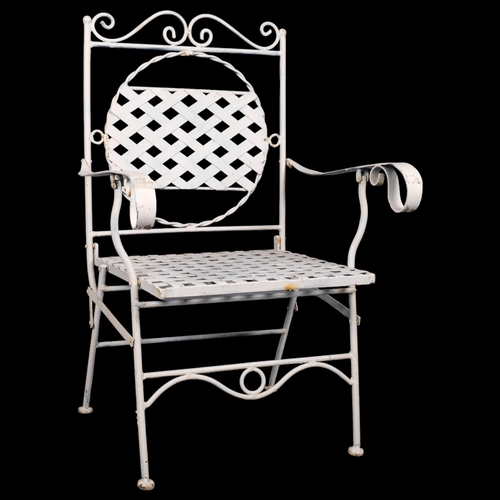 2988 - A painted metal folding garden armchair with lattice seat and back panels.