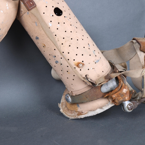 3030 - Human Anatomy : An early 20th Century prosthetic left leg, makers label present but undecipherable, ... 