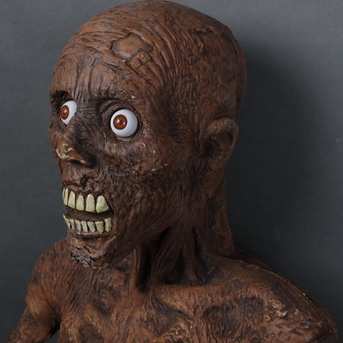 3040 - Curiosity/Macabre : A rubber half-body of a zombie, likely a theatre prop, torso and head, height 47... 