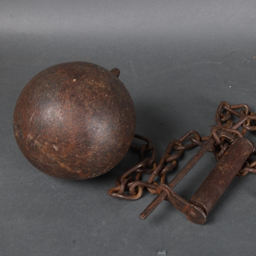 3058 - Curiosity/Macabre : An Antique cast iron prisoners gaol ball and chain leg shackle, with lock and ke... 