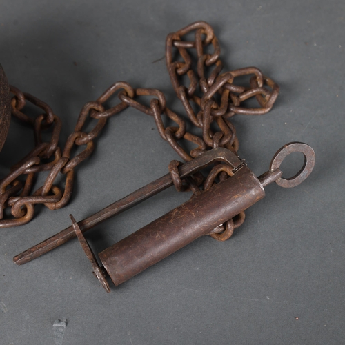 3058 - Curiosity/Macabre : An Antique cast iron prisoners gaol ball and chain leg shackle, with lock and ke... 