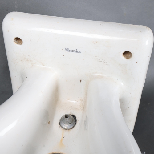 3070 - Curiosity/Macabre:  In The Manner of Marcel Duchamp
A 'Shanks' porcelain water fountain / sink repur... 