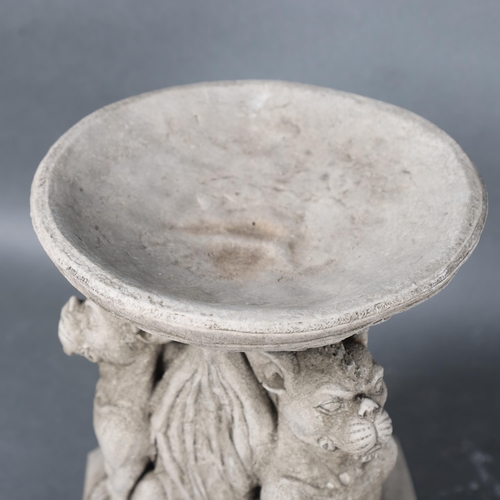 3072 - Curiosity/Macabre : A cast stoneware birdbath, bath is supported by three seated Gargoyles, height 2... 