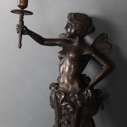 3086 - Curiosity: Bronze Fairy Wall Sconce 
Heavy bronze wall sconce in the form of a fairy. One outstretch... 