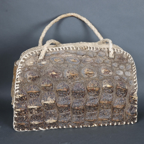 3117 - Taxidermy Curiosity: Blonde “Hornback” Crocodile Bag, early 20th century.
An unusual doctor bag made... 