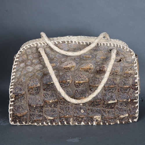 3117 - Taxidermy Curiosity: Blonde “Hornback” Crocodile Bag, early 20th century.
An unusual doctor bag made... 