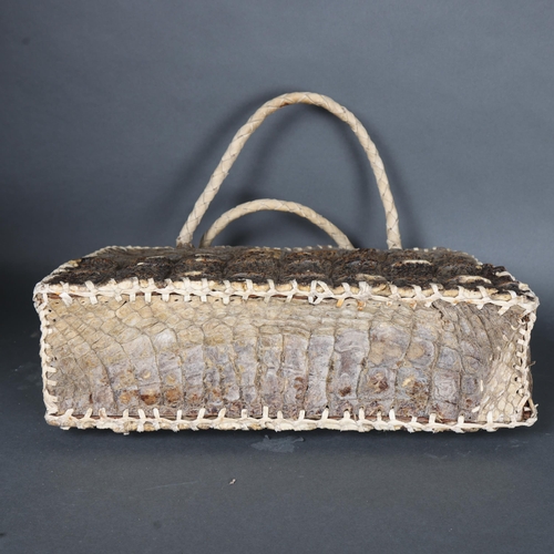 3117 - Taxidermy Curiosity: Blonde “Hornback” Crocodile Bag, early 20th century.
An unusual doctor bag made... 