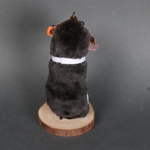 3123 - Taxidermy: “Chainsaw Massacre” Mole.
An anthropomorphic full mount taxidermy mole, mounted upright o... 