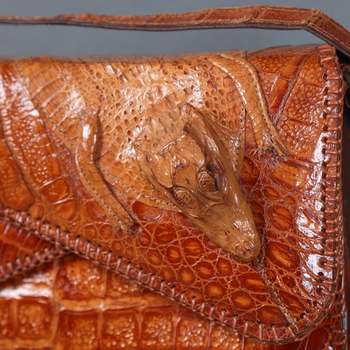 3156 - Taxidermy : A mid-century alligator skin handbag, no maker's label, width 27cm.