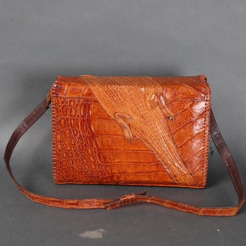 3156 - Taxidermy : A mid-century alligator skin handbag, no maker's label, width 27cm.