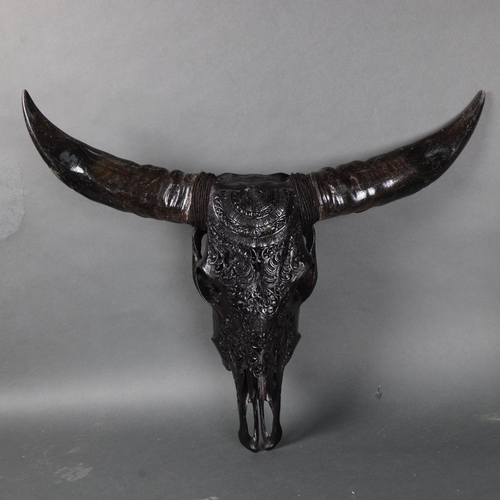 3157 - Taxidermy: Carved Water Buffalo Skull painted black.
A large and impressive water buffalo cranium an... 