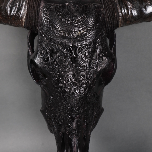 3157 - Taxidermy: Carved Water Buffalo Skull painted black.
A large and impressive water buffalo cranium an... 