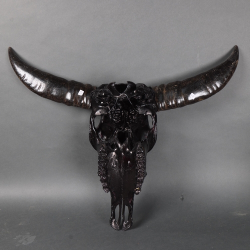 3157 - Taxidermy: Carved Water Buffalo Skull painted black.
A large and impressive water buffalo cranium an... 