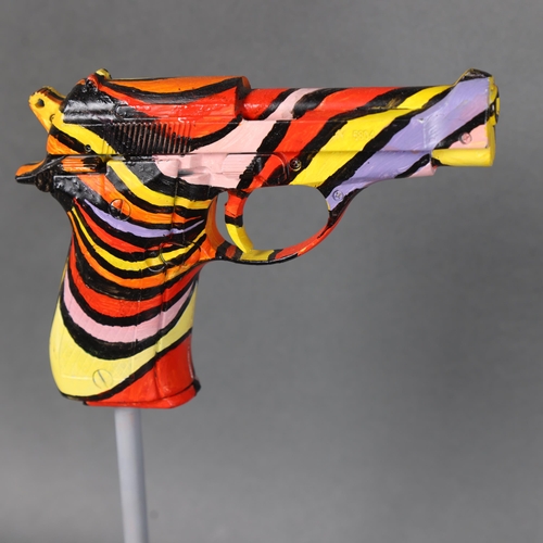 3165 - Curiosity/Macabre : An abstract study, pistol sculpture, on stand, unsigned, height 32cm.