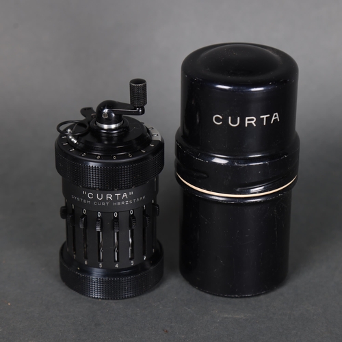 3214 - CURTA - a type I, number 8153, precision calculator, by Contina AG Mauren, with instruction booklet.