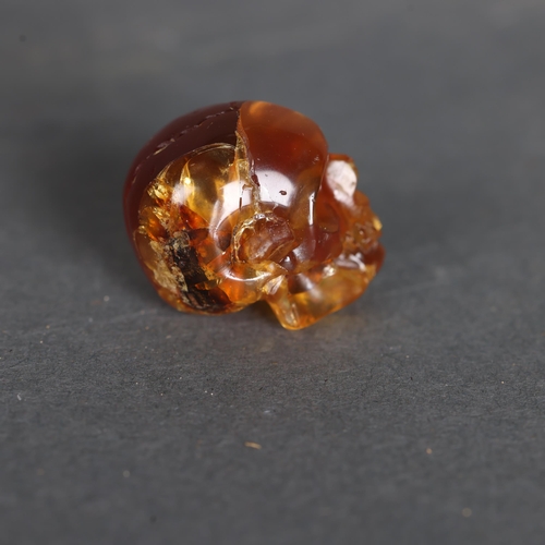 3236 - Human Anatomy: Amber Human Skull
Hand carved and polished from a natural, untreated piece of genuine... 