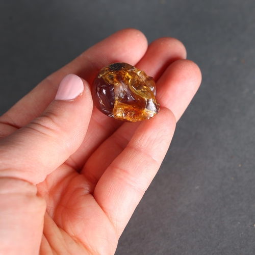 3236 - Human Anatomy: Amber Human Skull
Hand carved and polished from a natural, untreated piece of genuine... 