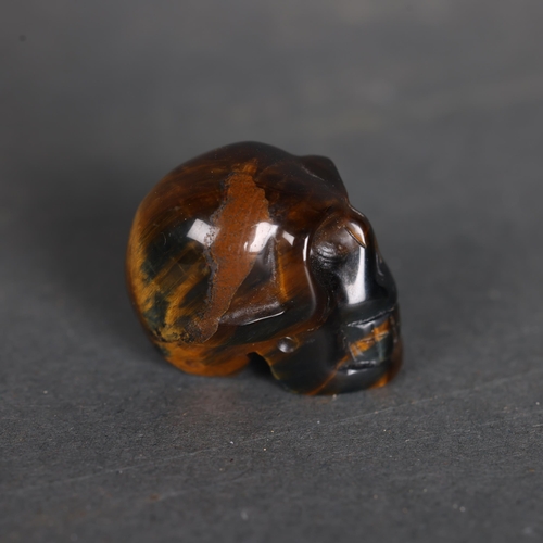 3238 - Human Anatomy: Tigers Eye Human Skull
Hand carved and polished