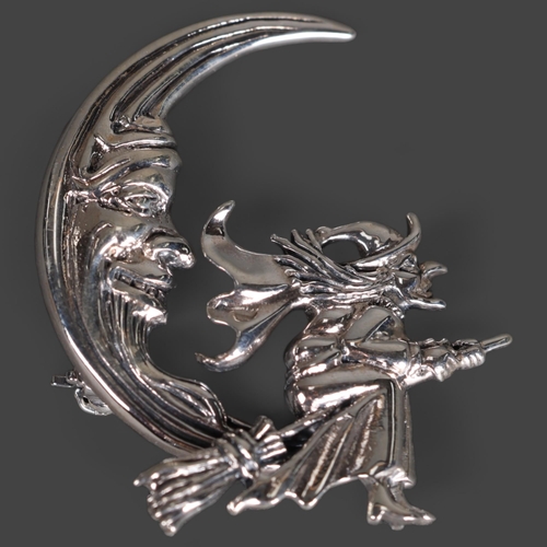 3241 - Curiosity/Macabre: Silver Brooch in the form of a witch on broomstick in crescent moon. Marked sterl... 