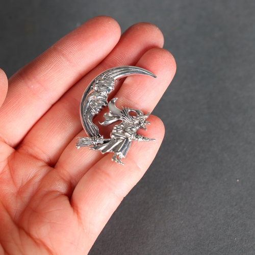 3241 - Curiosity/Macabre: Silver Brooch in the form of a witch on broomstick in crescent moon. Marked sterl... 