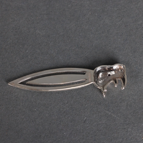 3248 - Natural History: Silver Rhino head bookmark with pink ruby chip eye. Marked sterling