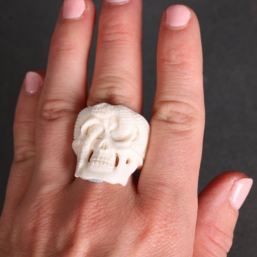 3260 - Curiosity/Macabre: Ring hand carved from water buffalo bone. Intricately detailed and carved in the ... 