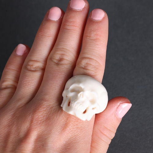 3261 - Curiosity/Macabre : Ring hand carved from water buffalo bone. Intricately detailed and carved in the... 