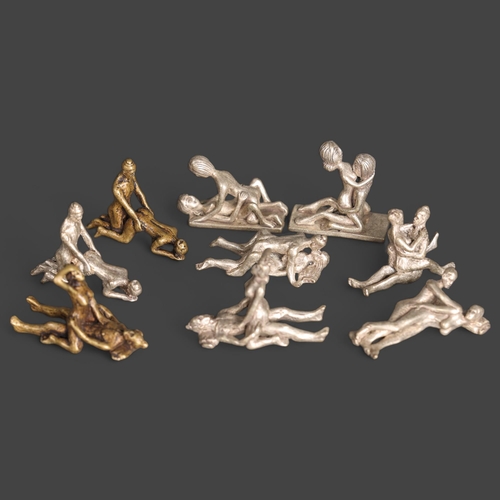 3263 - Curiosity/Macabre : A group of nine small brass and base metal erotic sculptures, (9).