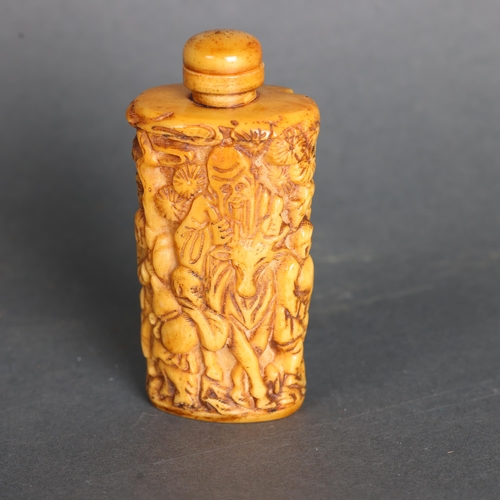 3270 - Chinese Bone Snuff Bottle depicting God of Longevity riding a deer.
The carving in elaborate deep re... 