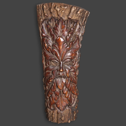 3275 - Antlers and Horns: Antler Carved with Green Man Foliate Head 
A thick section of stag antler elabora... 