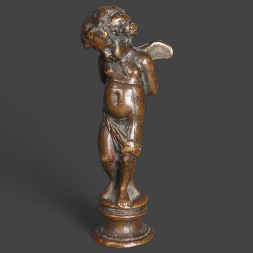 3277 - Bronze Statue of Cupid Bound 
A solid minature bronze of a bound Cupid, often titled “Les Liens De L... 