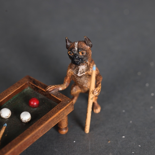 3281 - A cold painted bronze animalier group study of two Pug dogs playing billiards, marked to base 'KLL',... 