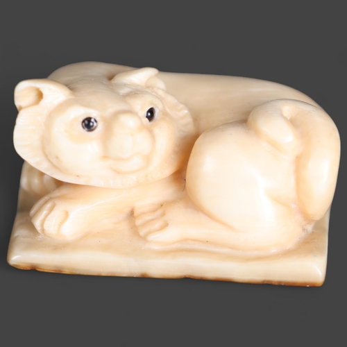 3296 - Netsuke: Cat, carved from Mammoth tusk ivory
Exquisitely carved from this ~15,000 year old material ... 