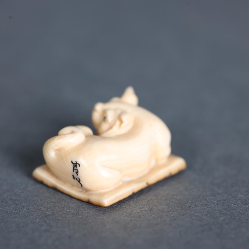 3296 - Netsuke: Cat, carved from Mammoth tusk ivory
Exquisitely carved from this ~15,000 year old material ... 