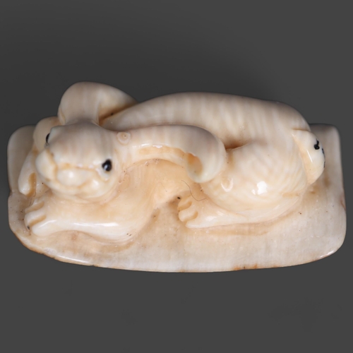 3299 - Netsuke: Rabbit / Hare, carved from Mammoth tusk ivory. Exquisitely carved from this ~15,000 year ol... 