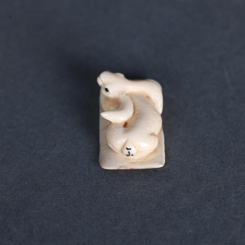 3299 - Netsuke: Rabbit / Hare, carved from Mammoth tusk ivory. Exquisitely carved from this ~15,000 year ol... 