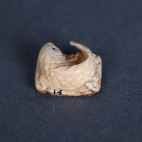 3300 - Netsuke: Koi Carp Fish, carved from Mammoth tusk ivory
Exquisitely carved from this ~15,000 year old... 