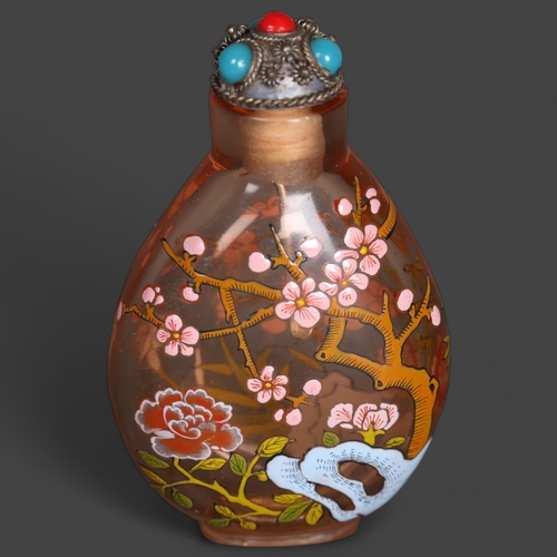 3308 - Chinese Snuff bottle. Peach clear glass with enamel decoration of cheery blossom and other flora. Th... 