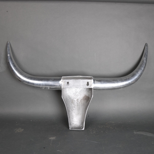 3374 - Natural History : An aluminium wall hanging sculpture in the form a Steer,  length 95cm.