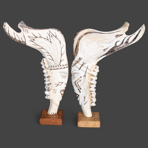 3410 - Natural History : Carved Pair of North American Elk Jaws.
Each jaw still retaining original teeth. T... 