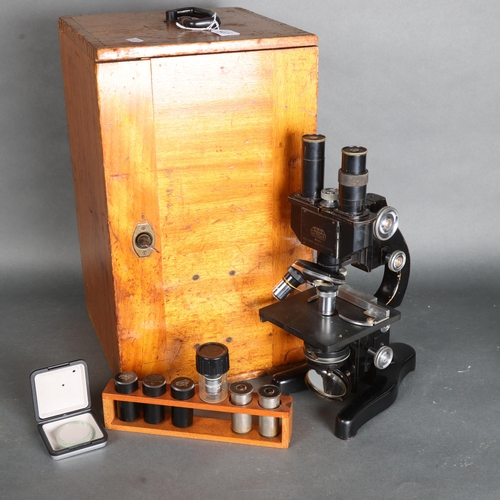 3437 - E. Leitz Wetzlar, an early 20th Century oxidised microscope, number 316310, in original wooden case,... 