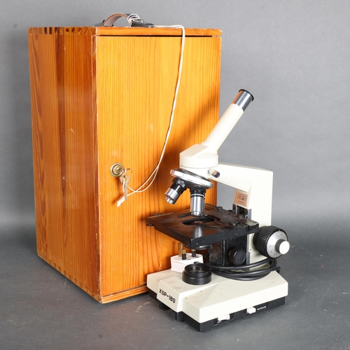 3439 - A XSP-18S vintage electric microscope, supplied by Brunel Microscopes Limited, in original wooden ca... 