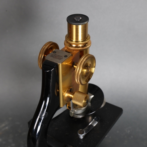 3440 - Ernst Leitz Wetzlar, an early 20th Century brass painted monocular microscope, number 208296, in ori... 