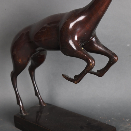 3460 - Natural History : A cast bronze study of a leaping antelope, unsigned, height 43cm.