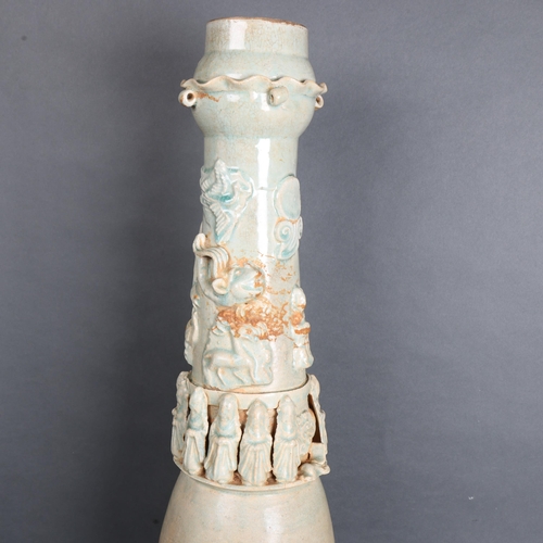 3466 - A tall Chinese Qingbai funerary vase with celadon glaze, with applied and moulded figural decoration... 