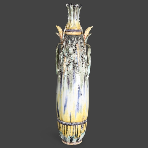 3467 - A tall 19th Century Austrian majolica corn vase, the abstract decorated body, pierced and with folia... 