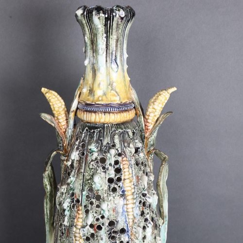 3467 - A tall 19th Century Austrian majolica corn vase, the abstract decorated body, pierced and with folia... 