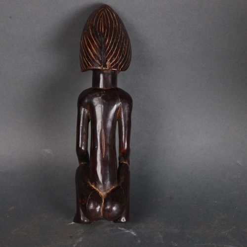 3473 - Tribal Art / Ethnographic: Hand carved wood fertility sculpture figure. Either reliquary or fertilit... 